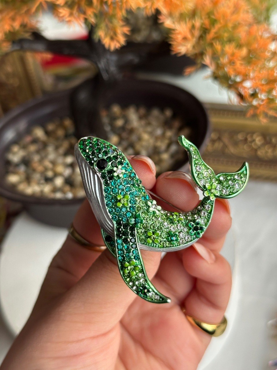 Green strass whale brooch