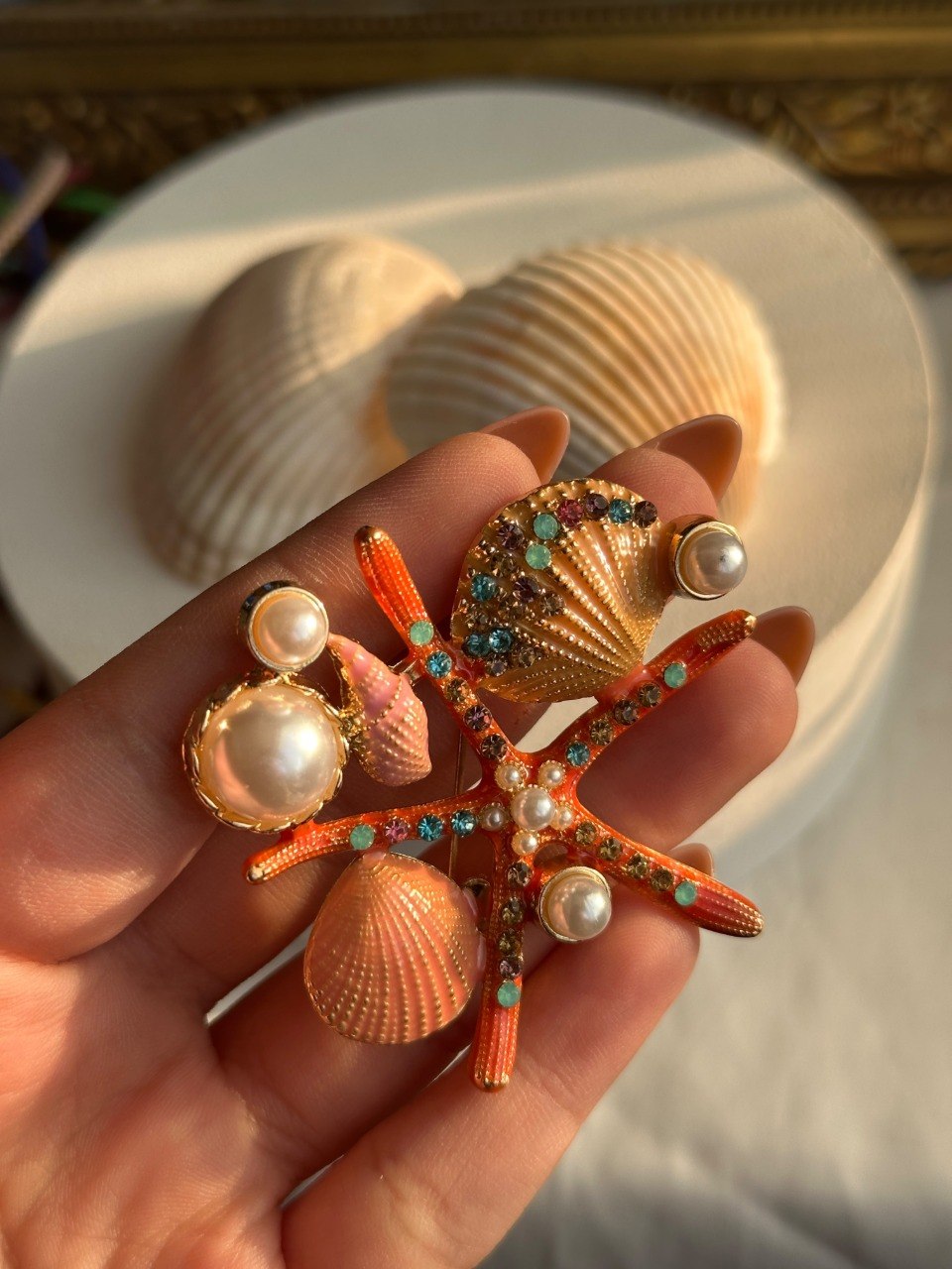 Orange seastar & seashell brooch